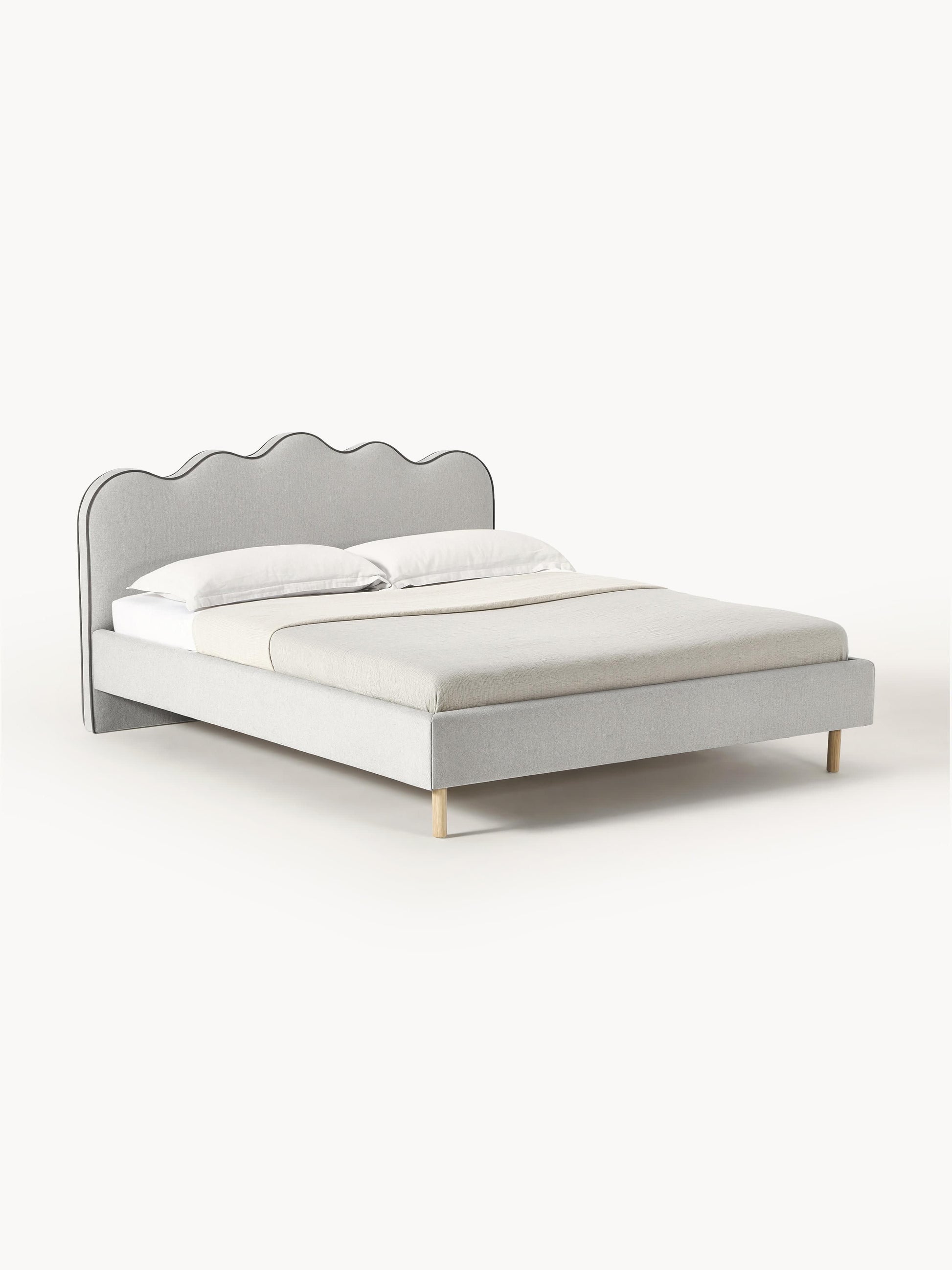 Romy Upholstered Bed with Wavy Headboard